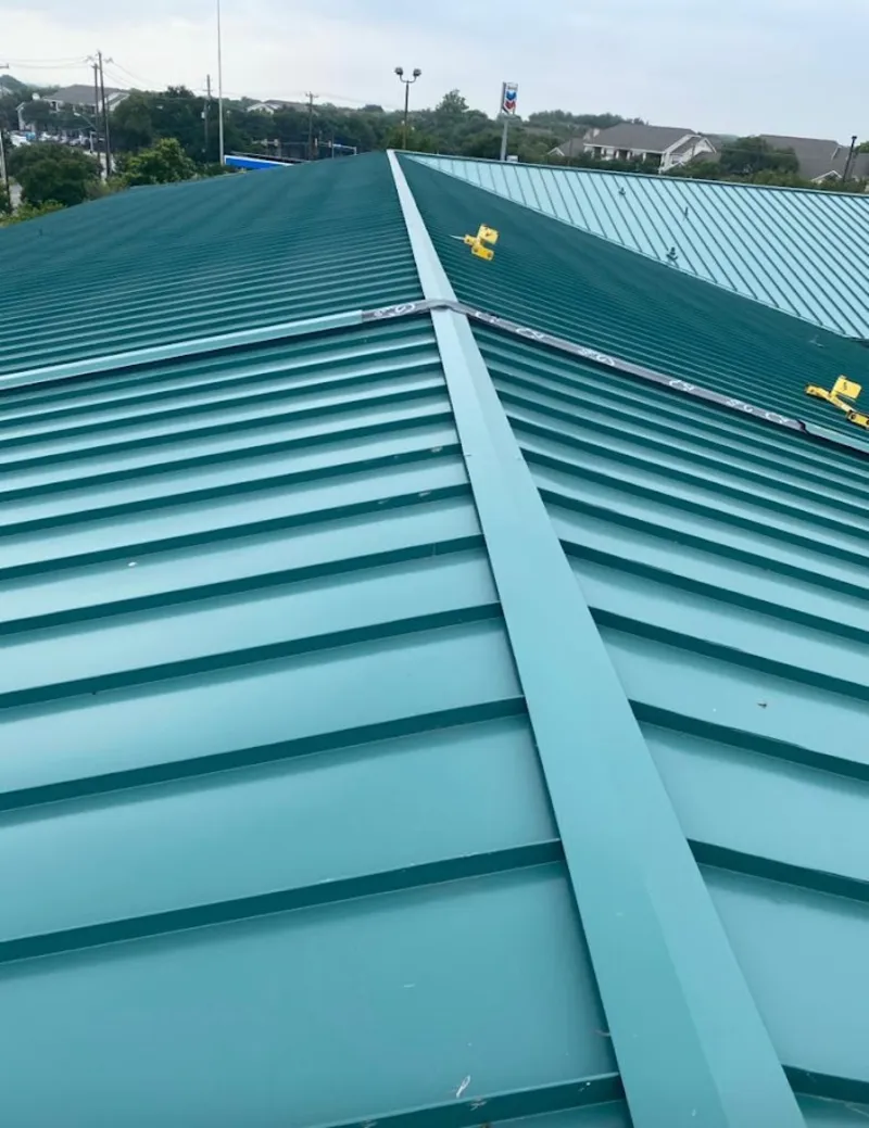 Green commercial metal roof ridge and valley for Metal Roof Repair in Newmarket